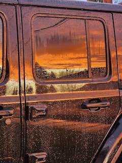 Wet Car Sunset Reflection