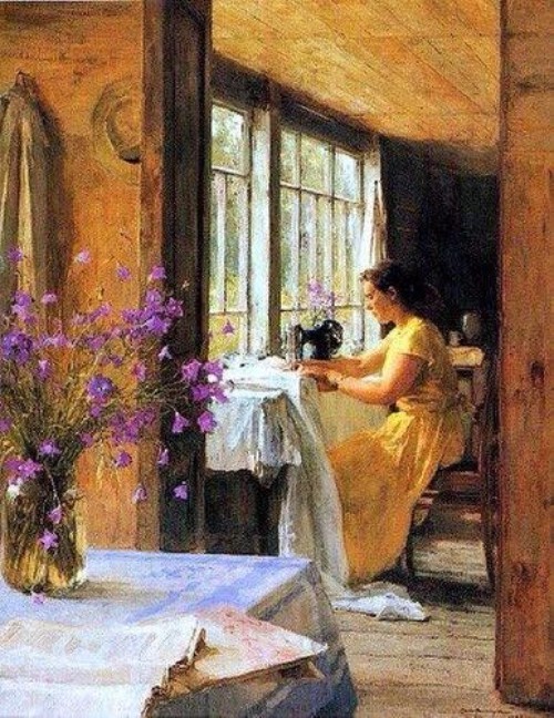 Woman in yellow dress sewing near window with purple flowers on table, warm-toned impressionist painting