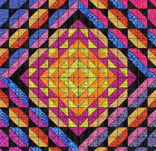 Colorful geometric quilt pattern with concentric diamonds in orange, yellow, pink, blue, purple and black