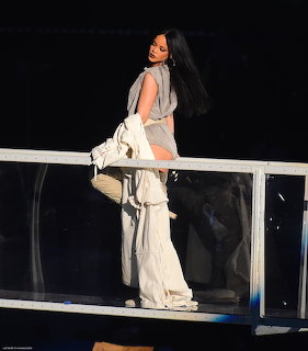 Rihanna singing on stage during Anti World Tour concert in Newark, 2016