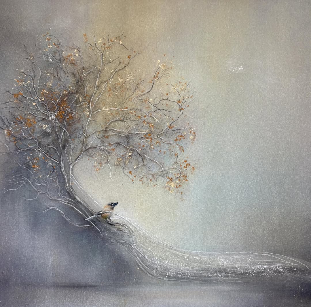 White peacock on branch with golden autumn leaves in misty atmospheric setting