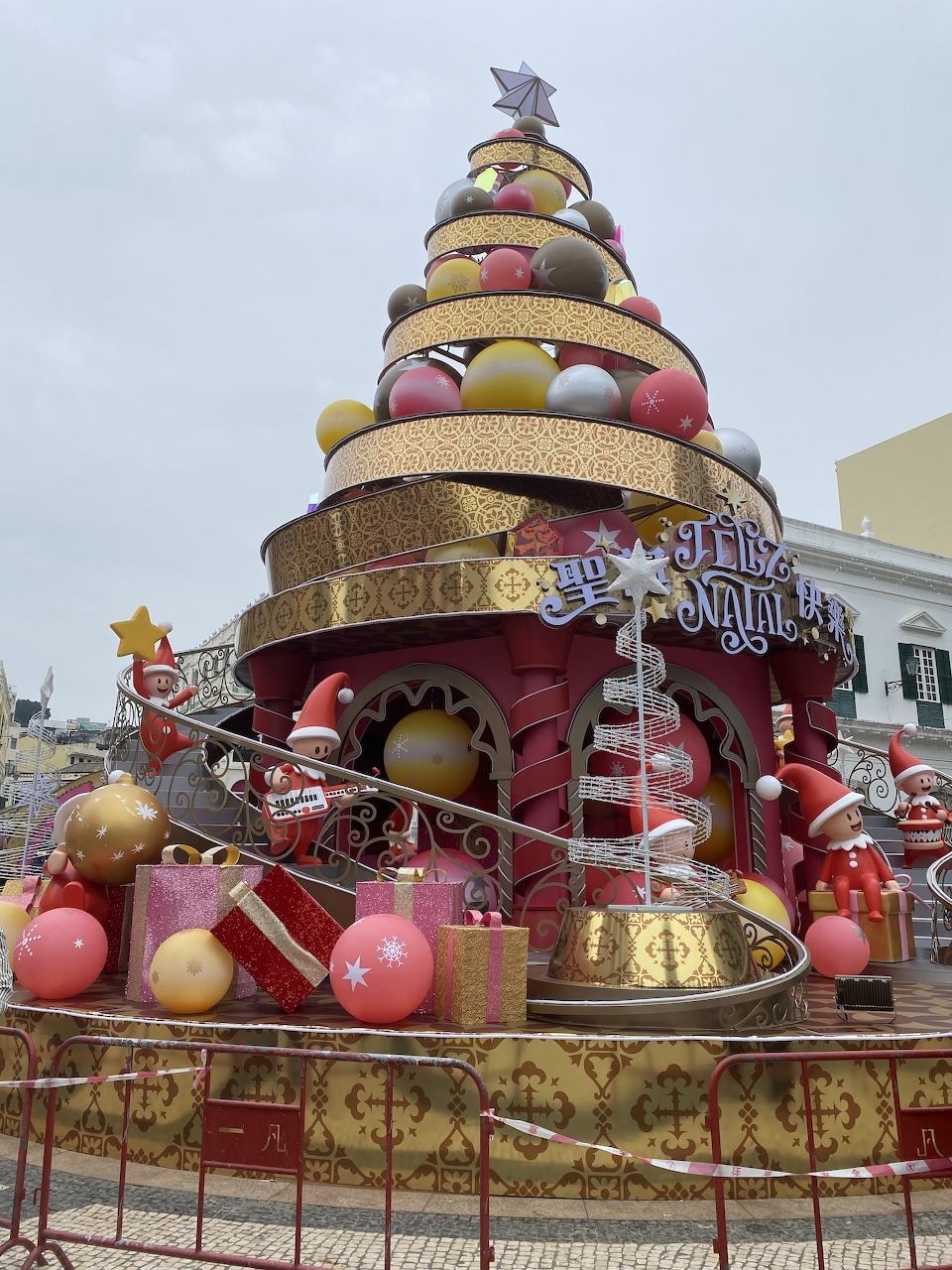 Christmas tree installation at Senado Square in Macao with wave-patterned pavement
