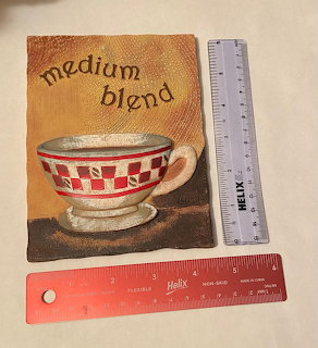 Illustration of red checkered coffee cup with medium blend text and rulers
