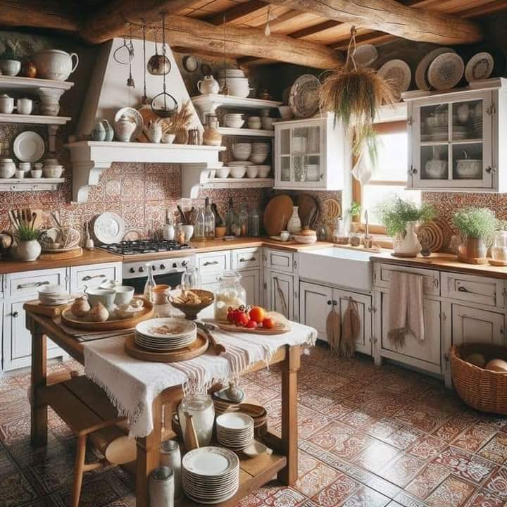 Cozy rustic kitchen with exposed beams, white cabinets, farmhouse sink, wooden island, and pottery on shelves