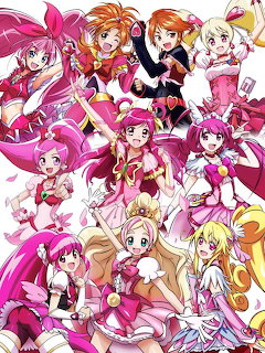 Group illustration of Pretty Cure anime magical girls in pink and white costumes with dynamic poses