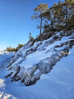Snowy Rocky Shore