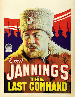 Vintage movie poster showing man in Russian military uniform with white fur hat against red and blue graphic background