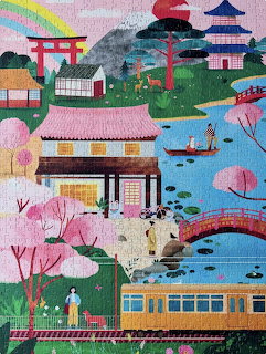 Vibrant illustration of Japanese garden with pagodas, torii gates, cherry blossoms, bridges, and traditional buildings