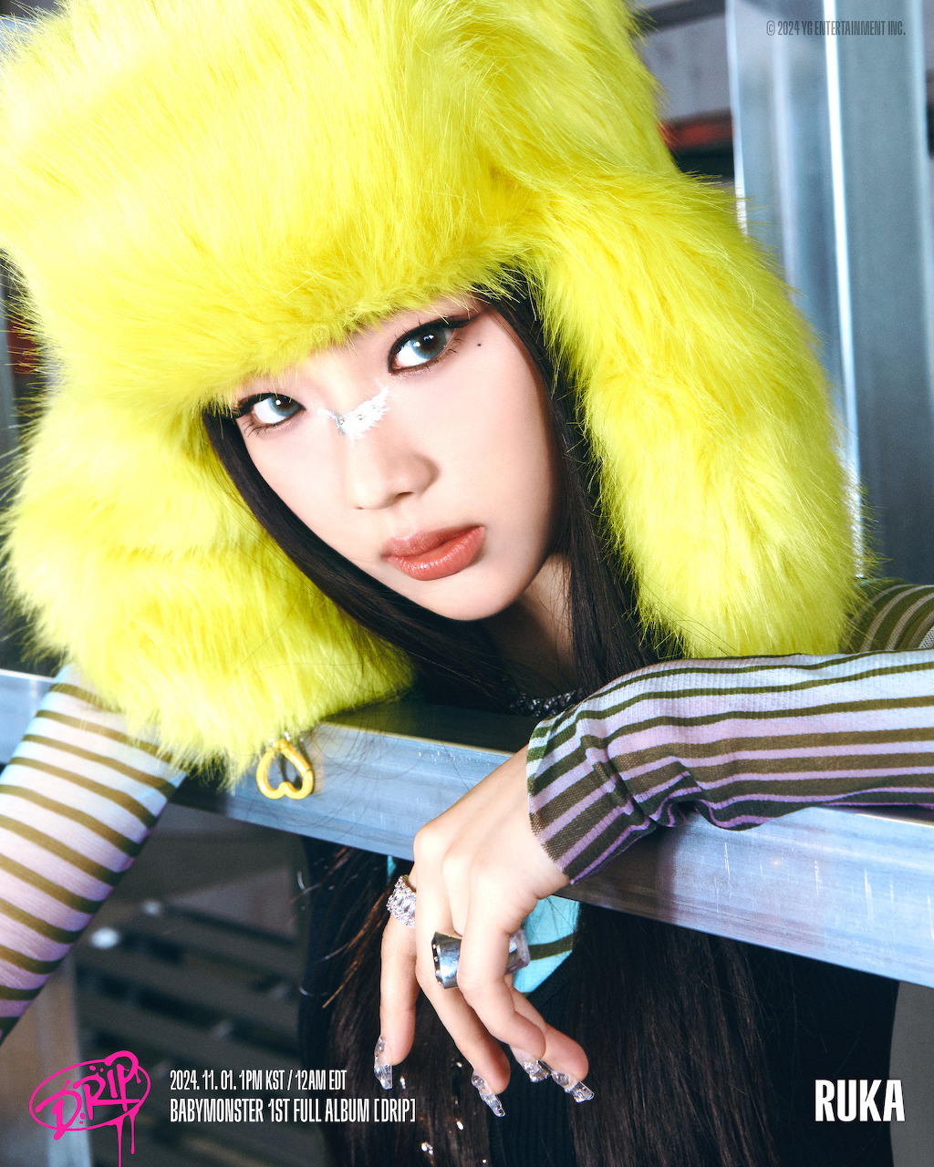 Portrait of BabyMonster member Ruka posing with a stylish fashion look