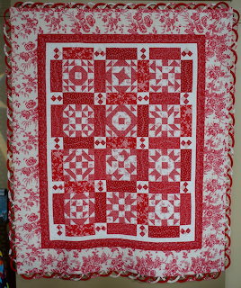 Red and White Floral Quilt