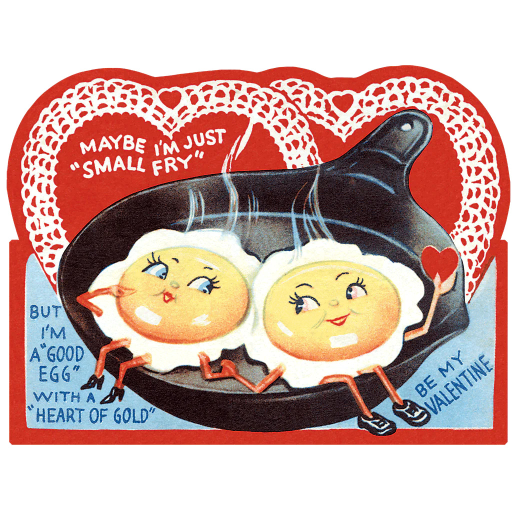 Vintage Valentine's Day card with two cartoon fried eggs in a pan surrounded by red hearts and lace doilies