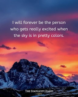 Colorful sunset sky with orange and purple clouds above dark mountain peaks with overlaid text quote