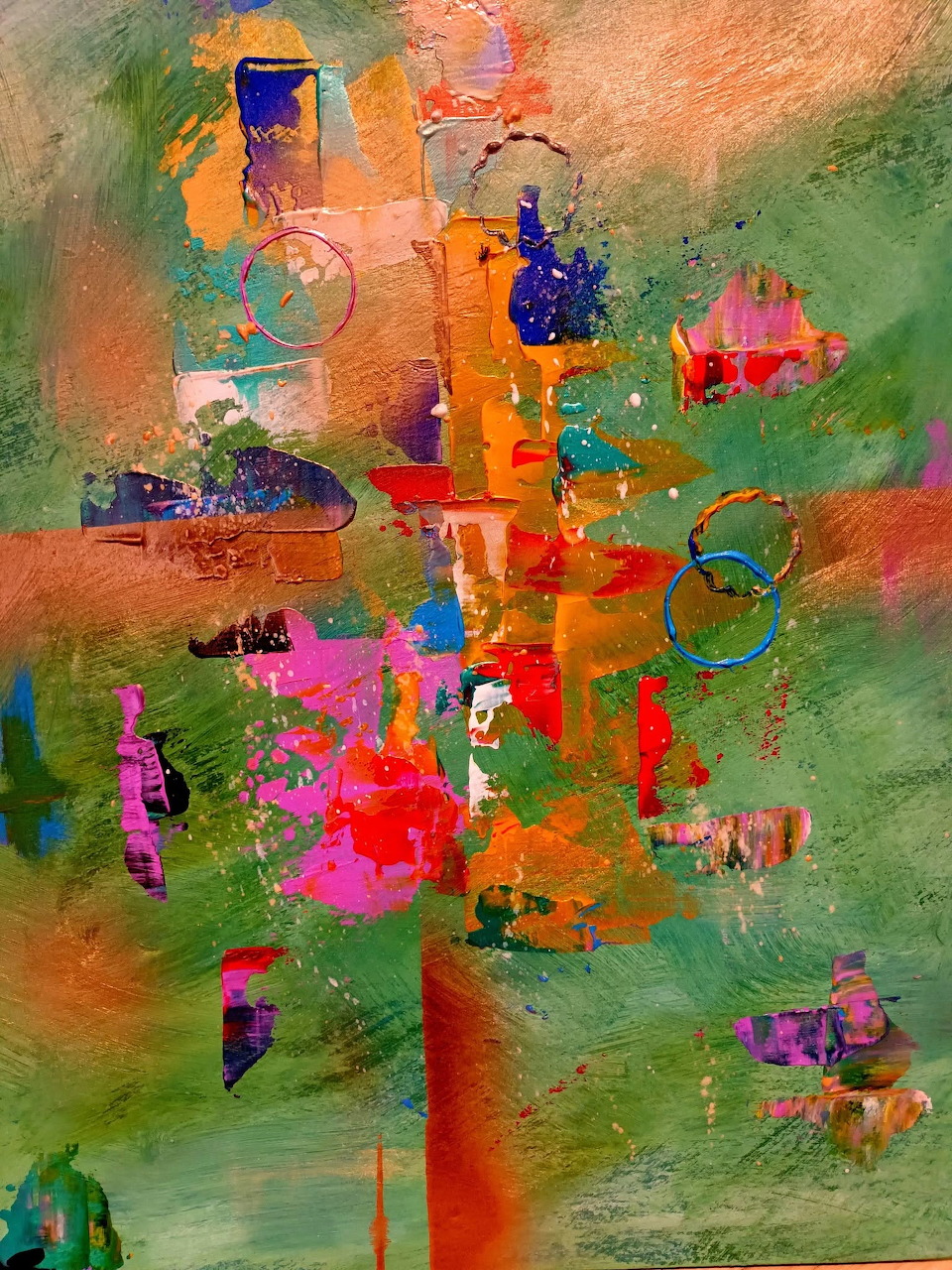 Abstract painting with vivid splashes of orange, pink, green, and blue in an expressive mixed media style