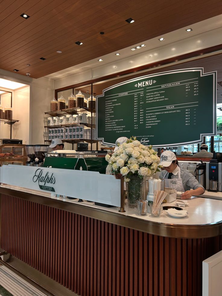 Ralph's Cafe exterior in Singapore with outdoor tables and greenery