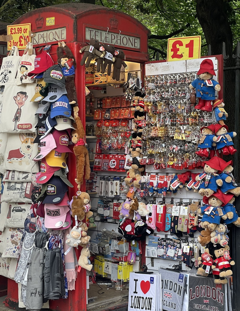 Outdoor souvenir stand with British themed merchandise and red phone box decoration