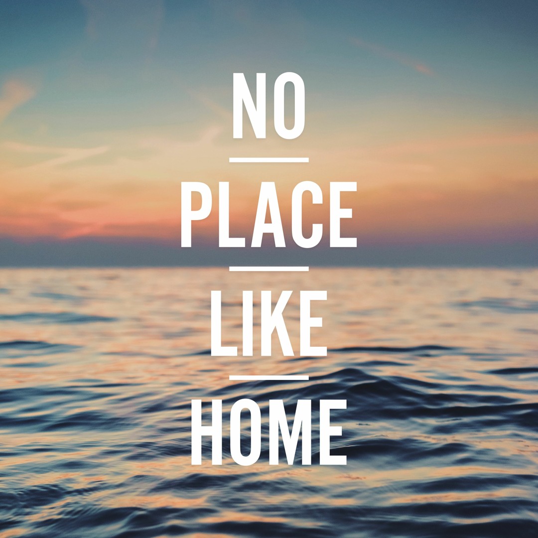 Text saying 'NO PLACE LIKE HOME' over ocean waves at sunset