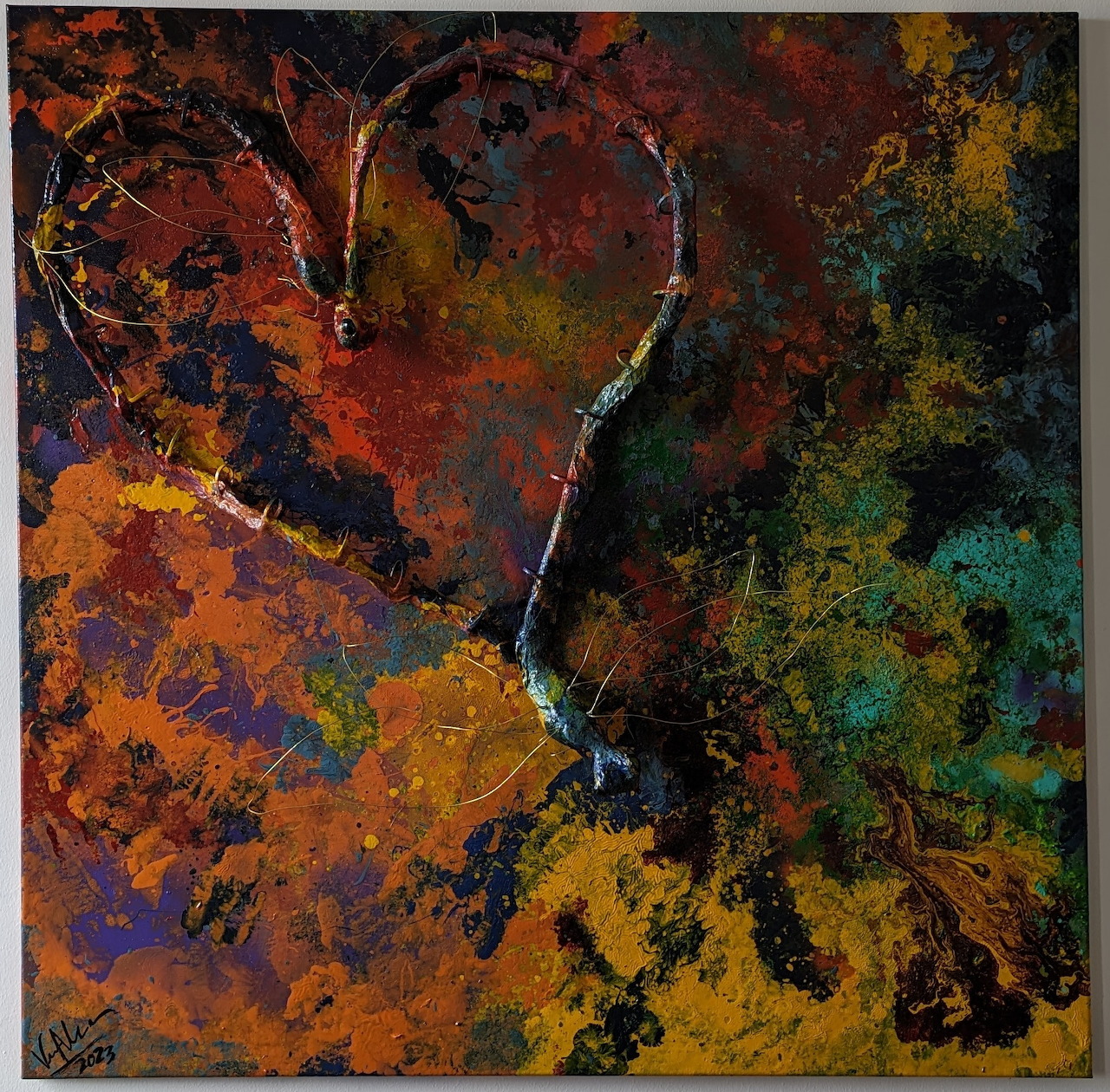 Abstract painting with heart shape and dragonflies in warm autumn colors on dark textured background