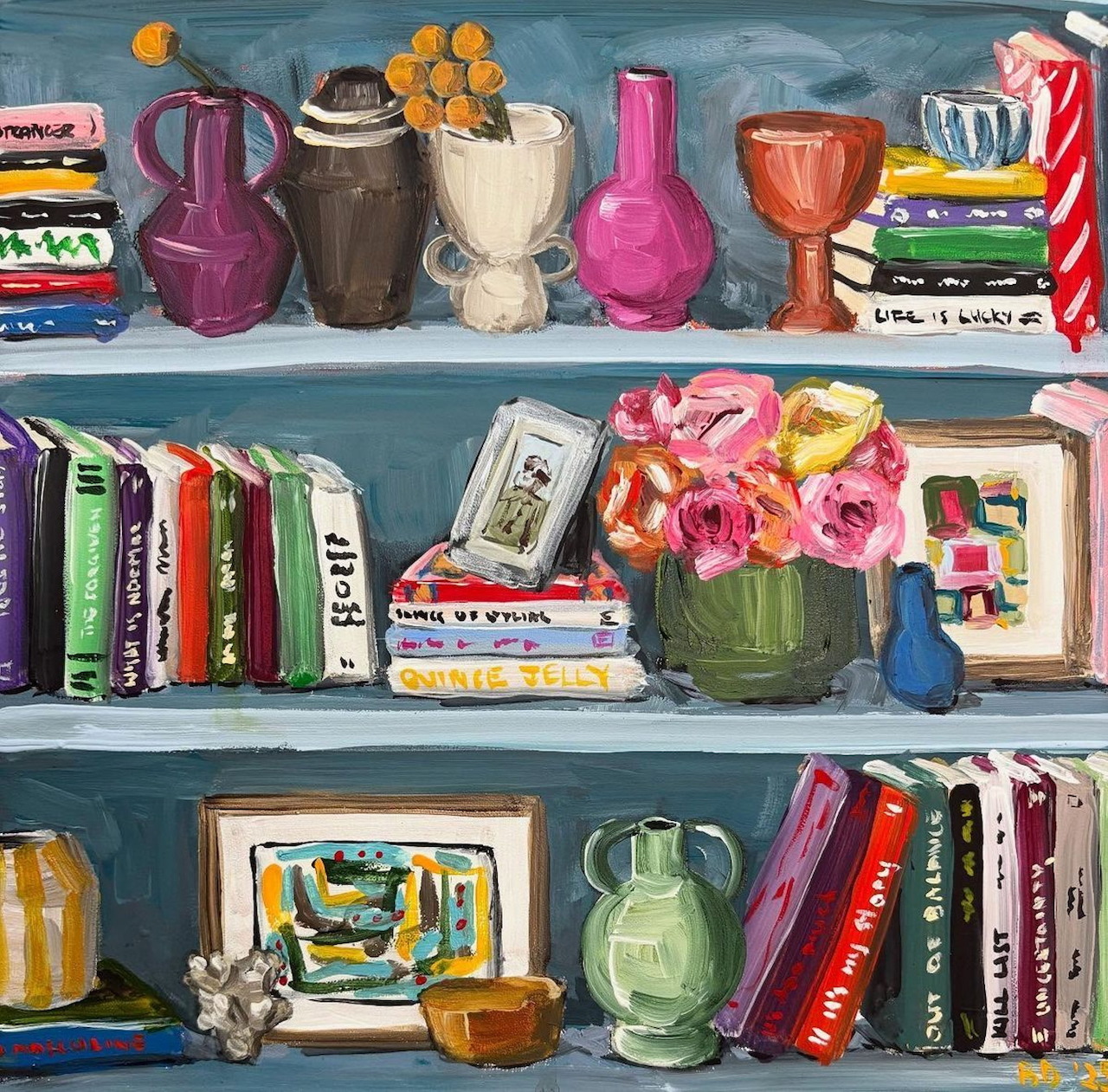 Painted bookshelf with colorful books, vases, flowers and decorative items on three shelves