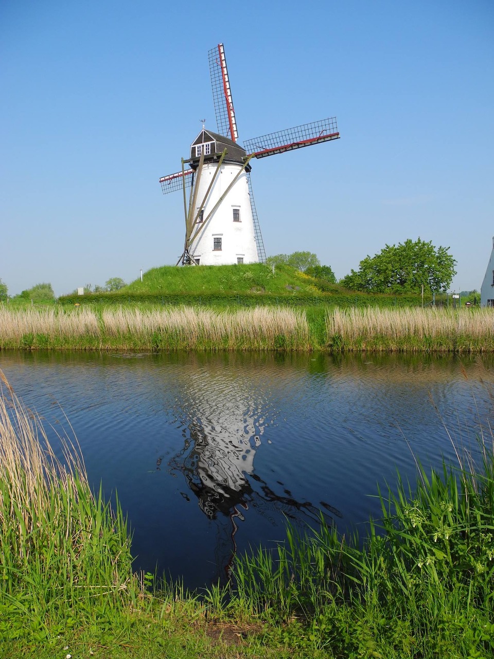 White Windmill by Water