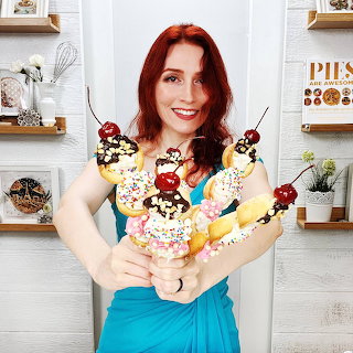 Woman Holding Decorated Ice Cream Cones