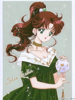 Anime illustration of Makoto Kino in a green dress with brown hair and green eyes holding a round ornament