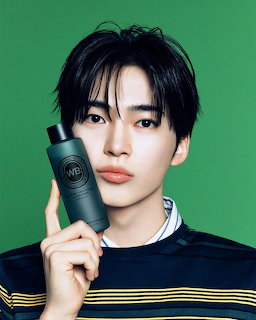 Young male K-pop idol Sung Hanbin posing for a portrait photo.