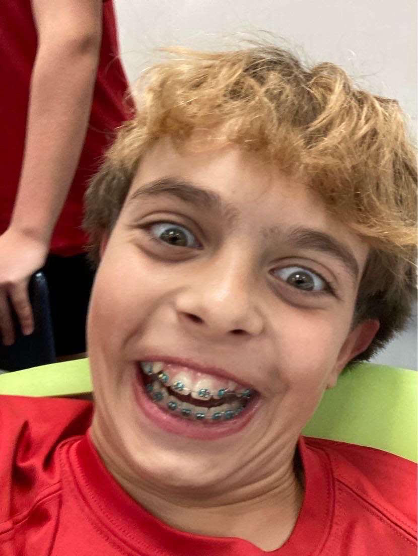 Smiling Boy with Braces