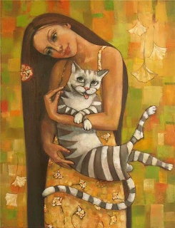 Girl Holding Striped Cat