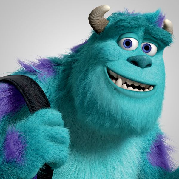 Sulley, the large blue and purple furry monster with horns from Monsters Inc, smiling at the camera