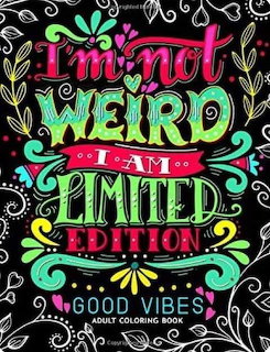 Colorful hand-lettered text on black background saying I'm not weird I am limited edition with decorative elements