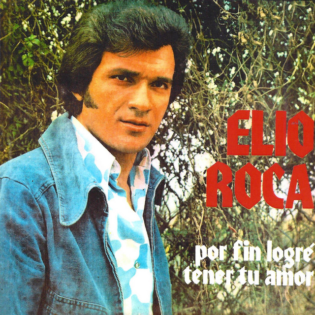Vintage album cover portrait of Elio Roca in a blue jacket outdoors with red lettering