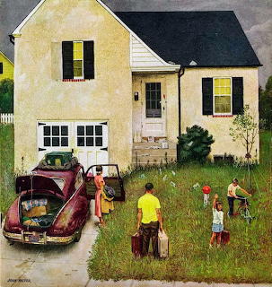 Family unpacking vintage car at yellow cottage with children on lawn