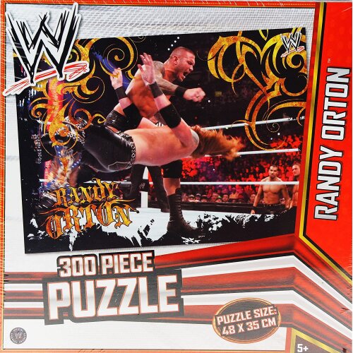 300-piece Randy Orton wrestling puzzle box with ring action artwork and bold red graphics