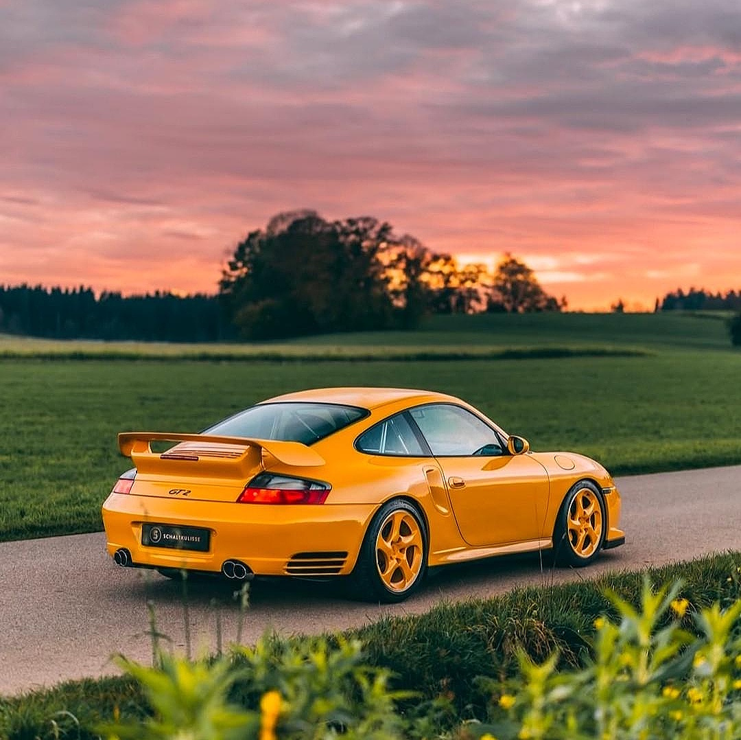 Orange Porsche 996 GT2 at Sunset