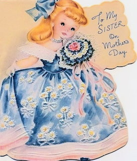 Vintage greeting card with blonde doll in blue dress holding flowers, text reads To My Sister on Mother's Day