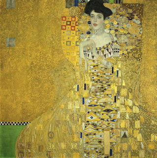 Woman in elaborate gold patterned dress against golden background, Klimt painting style