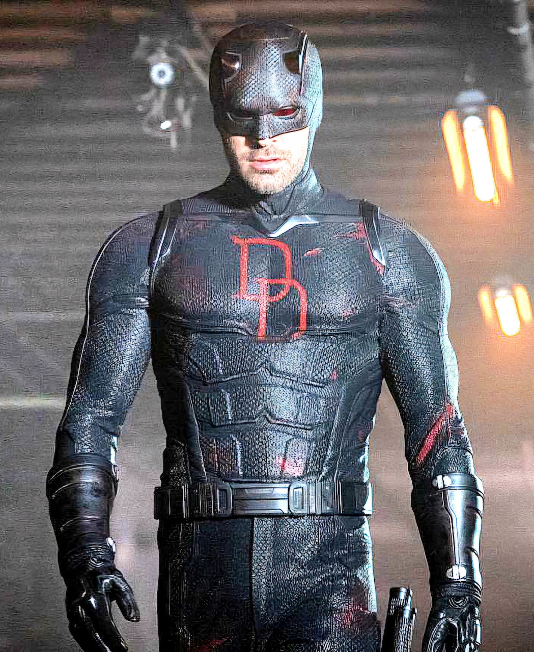 Daredevil in red suit with horns and billy clubs in a dark city setting