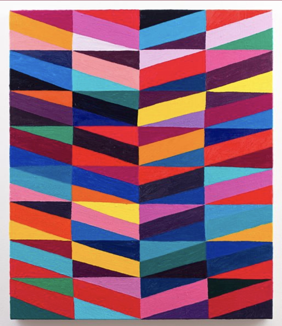 Abstract geometric pattern with multicolored chevron stripes in vertical columns