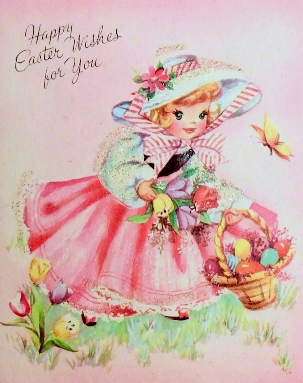 Vintage Easter card with a little girl in pink dress and bonnet holding a basket of colorful Easter eggs