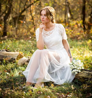Bride in Autumn Forest