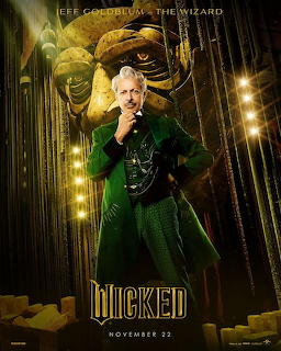 Woman in green outfit poses dramatically with dragon backdrop and stage lights on Wicked movie poster