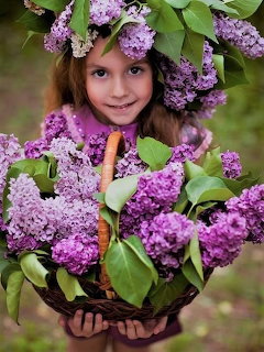 Girl with Lilac Flowers