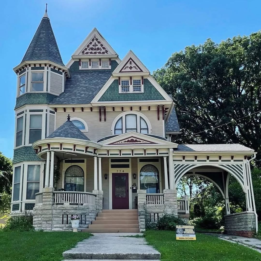 Victorian mansion with turret and ornate porch in Illinois