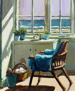 Painting of a rocking chair with blue blanket by a sunny window with ocean view and knitting basket