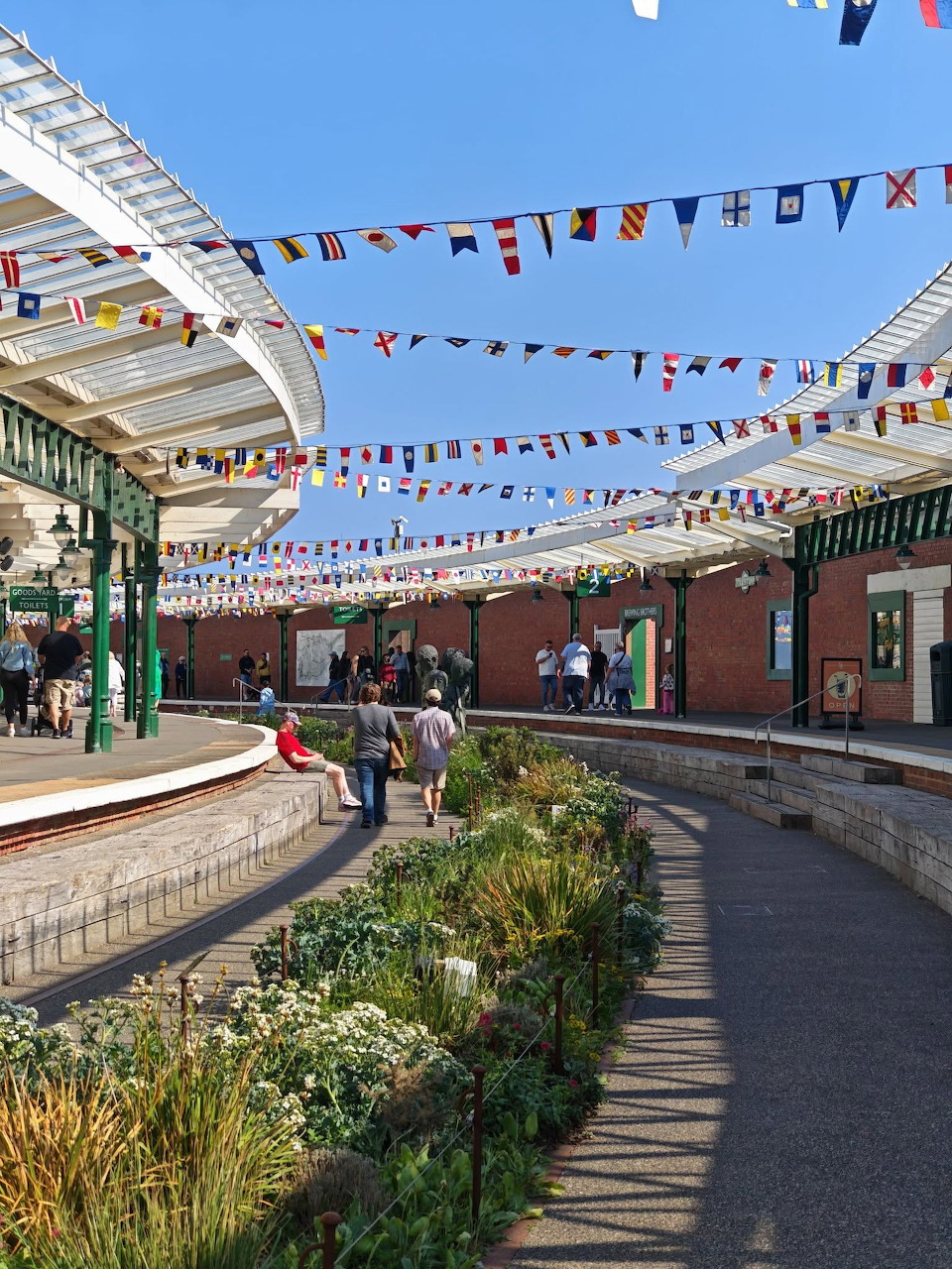 Disused Folkestone Harbour railway station with old tracks and platforms
