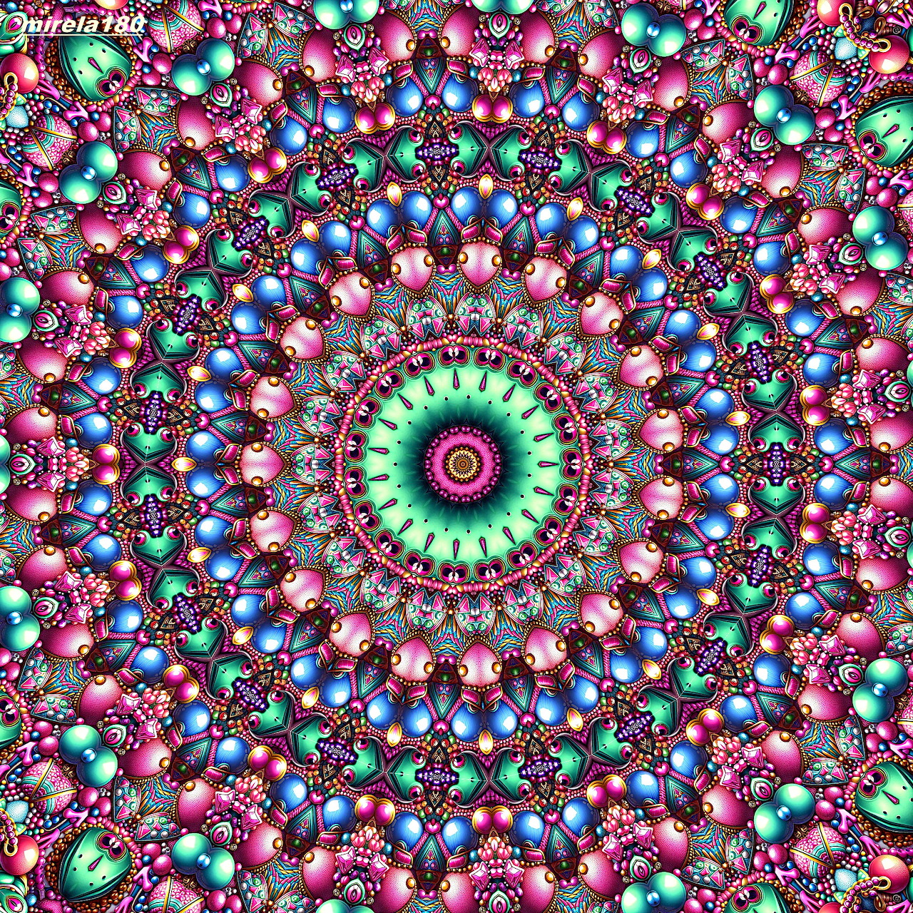 Vibrant mandala with pink, blue, and green symmetrical patterns radiating from a central multicolored circle