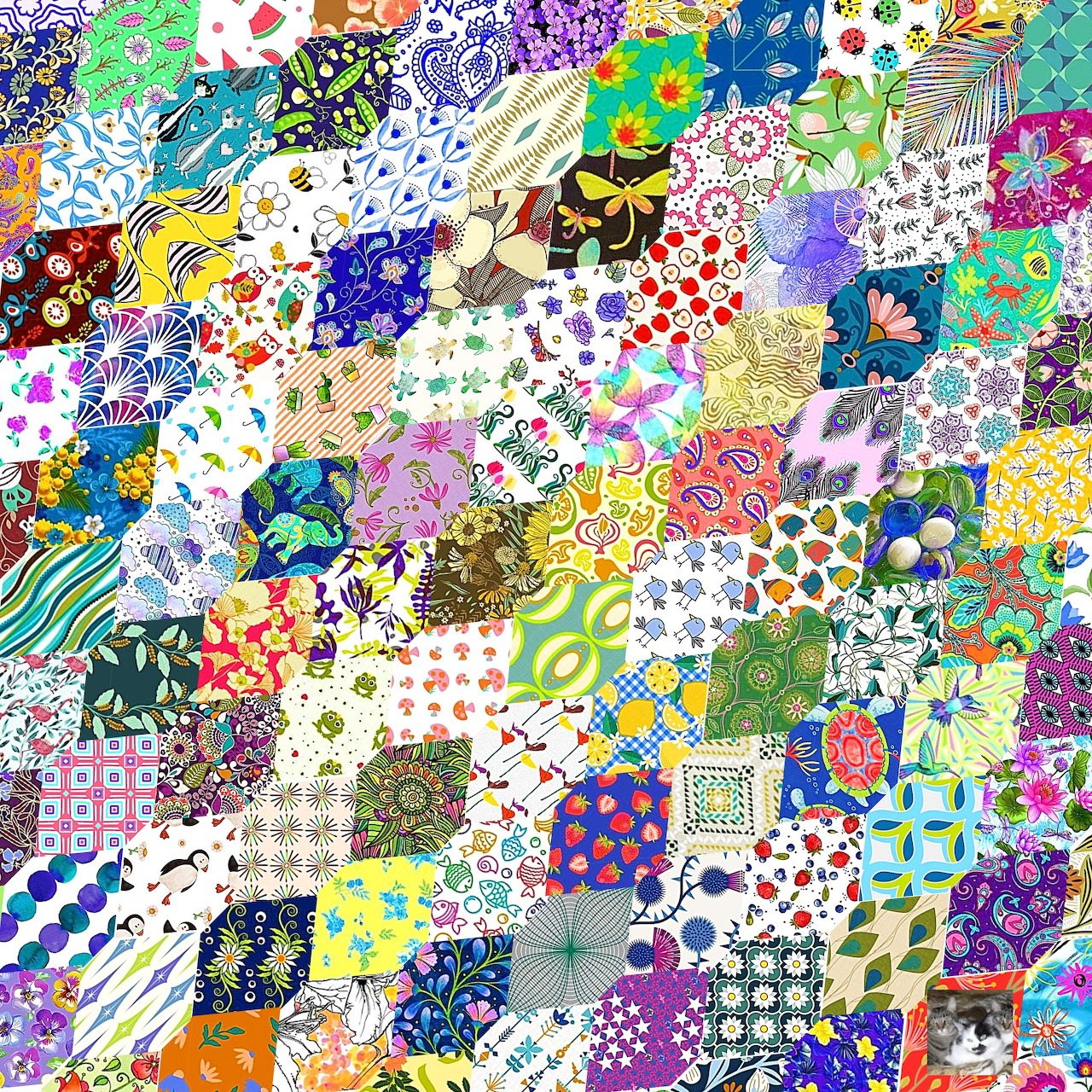 Colorful patchwork quilt design with varied fabric patterns including flowers, dots, stripes, and geometric shapes