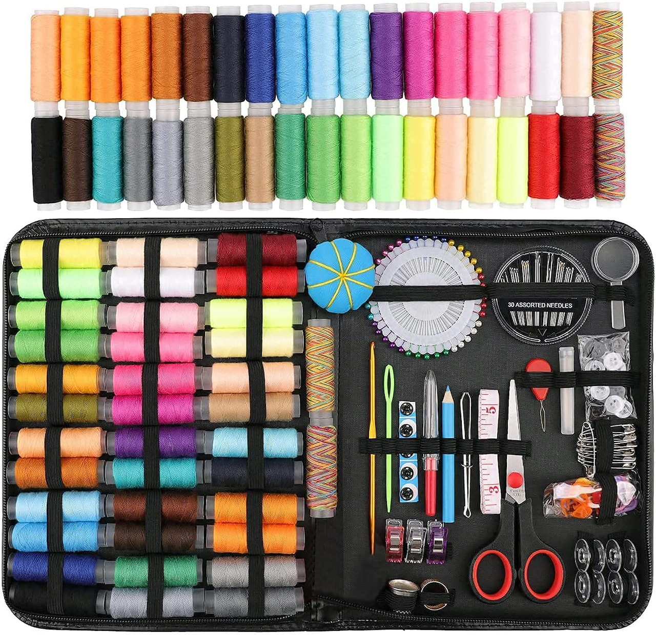 Open sewing kit with rainbow thread spools, scissors, buttons, and sewing tools neatly arranged