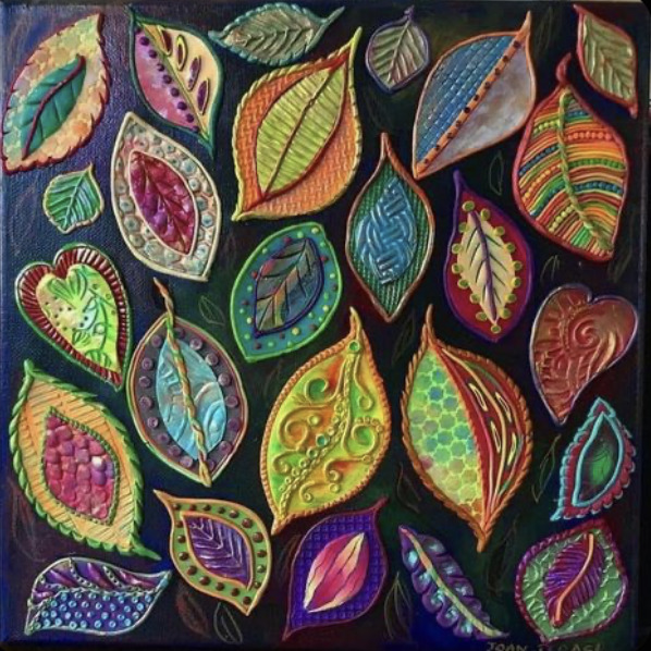 Colorful decorative leaves with intricate patterns on dark background