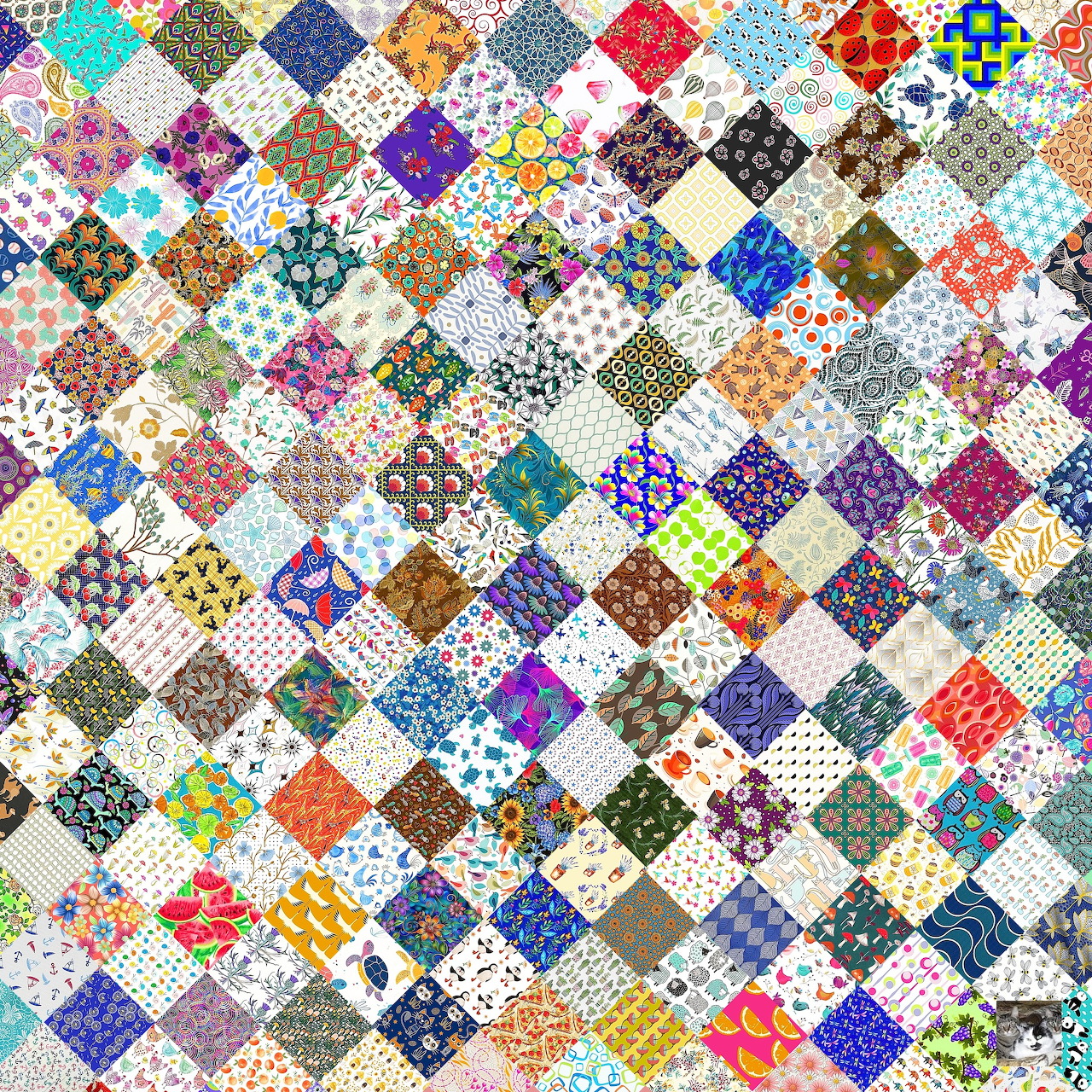 Colorful patchwork quilt with diagonal squares in various patterns and fabrics